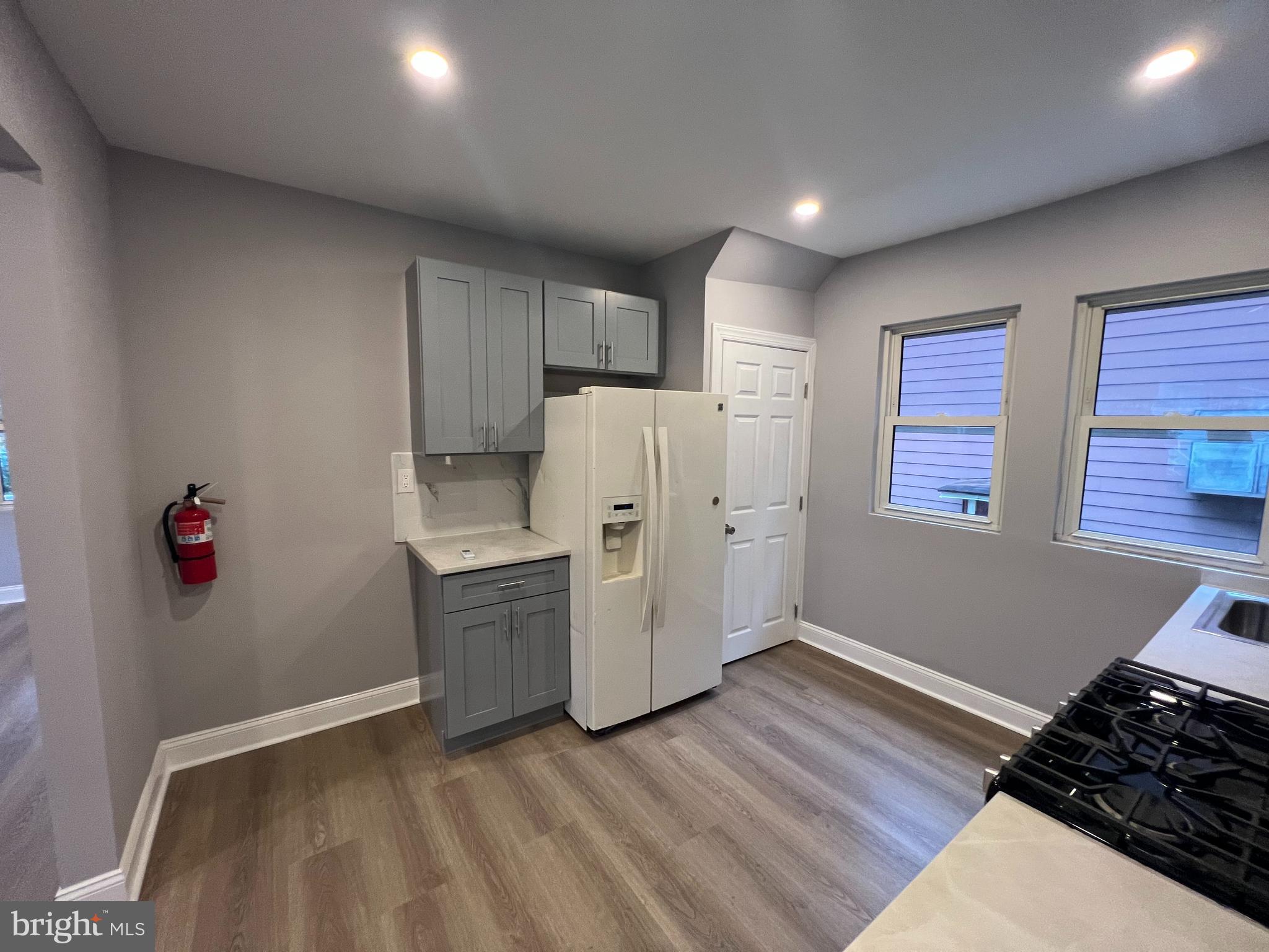 1301 Newton Avenue, Unit A Haddon Township, NJ 08107 - Photo 5 of 13 a view of kitchen with wooden floor and electronic appliances