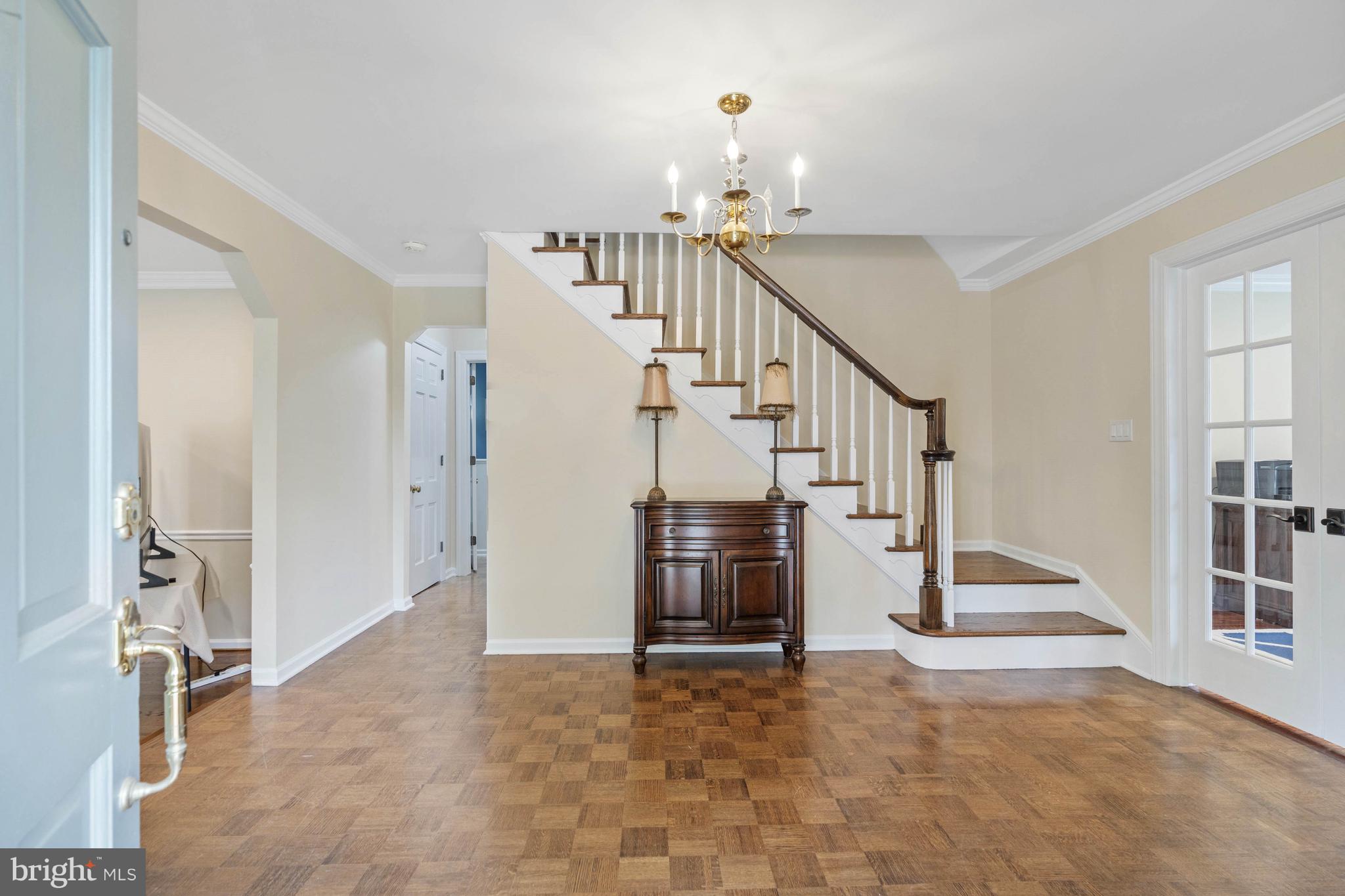 Foyer with parquet floor
