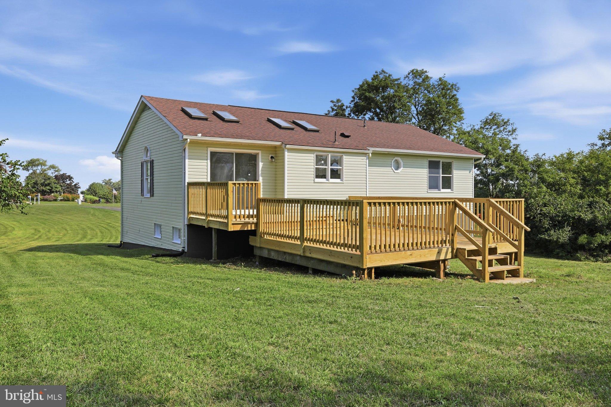 13835 McIntosh Circle Clear Spring, MD 21722 - Photo 27 of 32 Charming home with spacious deck and greenery.