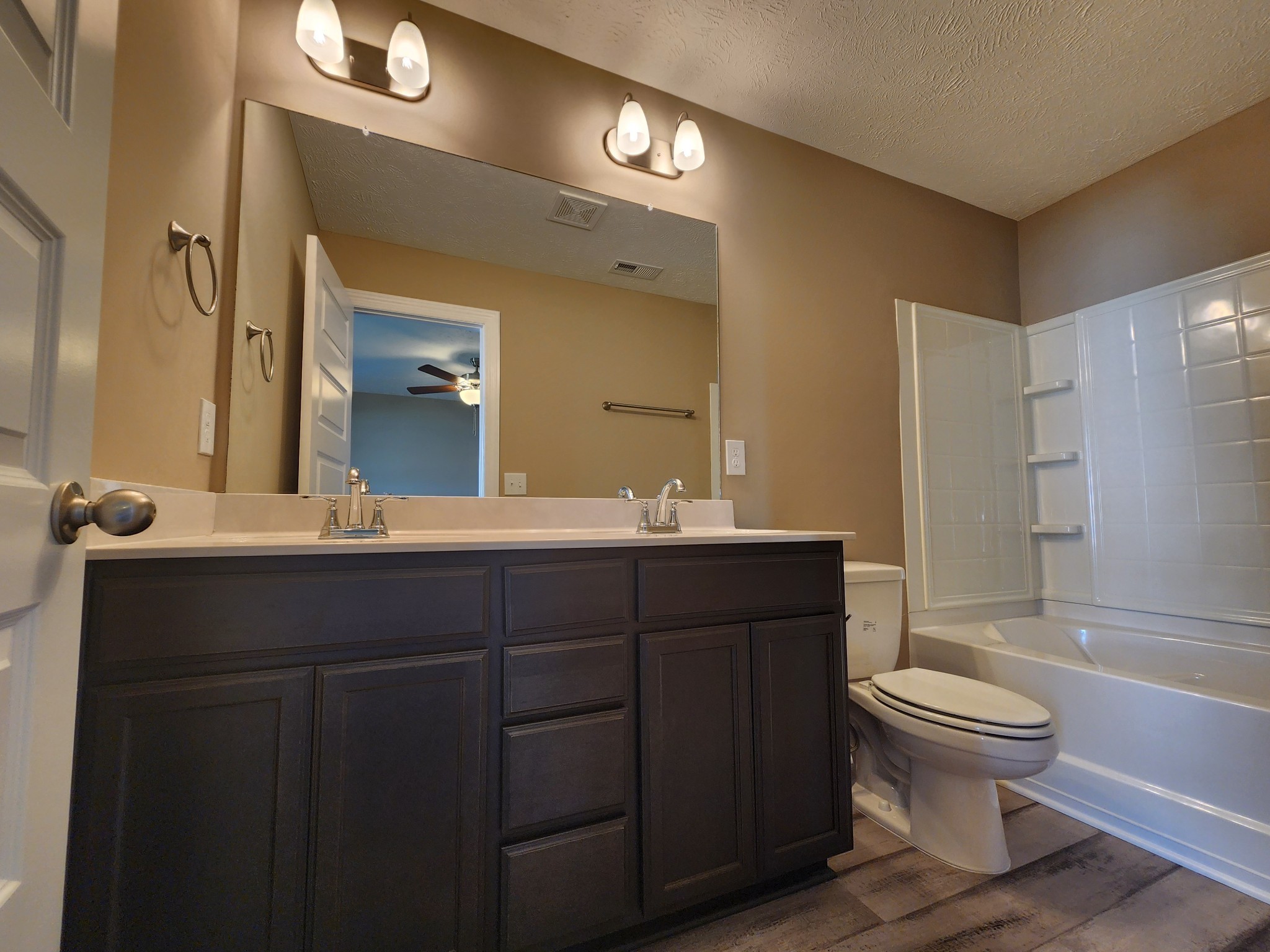2819 Upstream Road Christiana, TN 37037 - Photo 22 of 95 a bathroom with a sink a toilet and shower