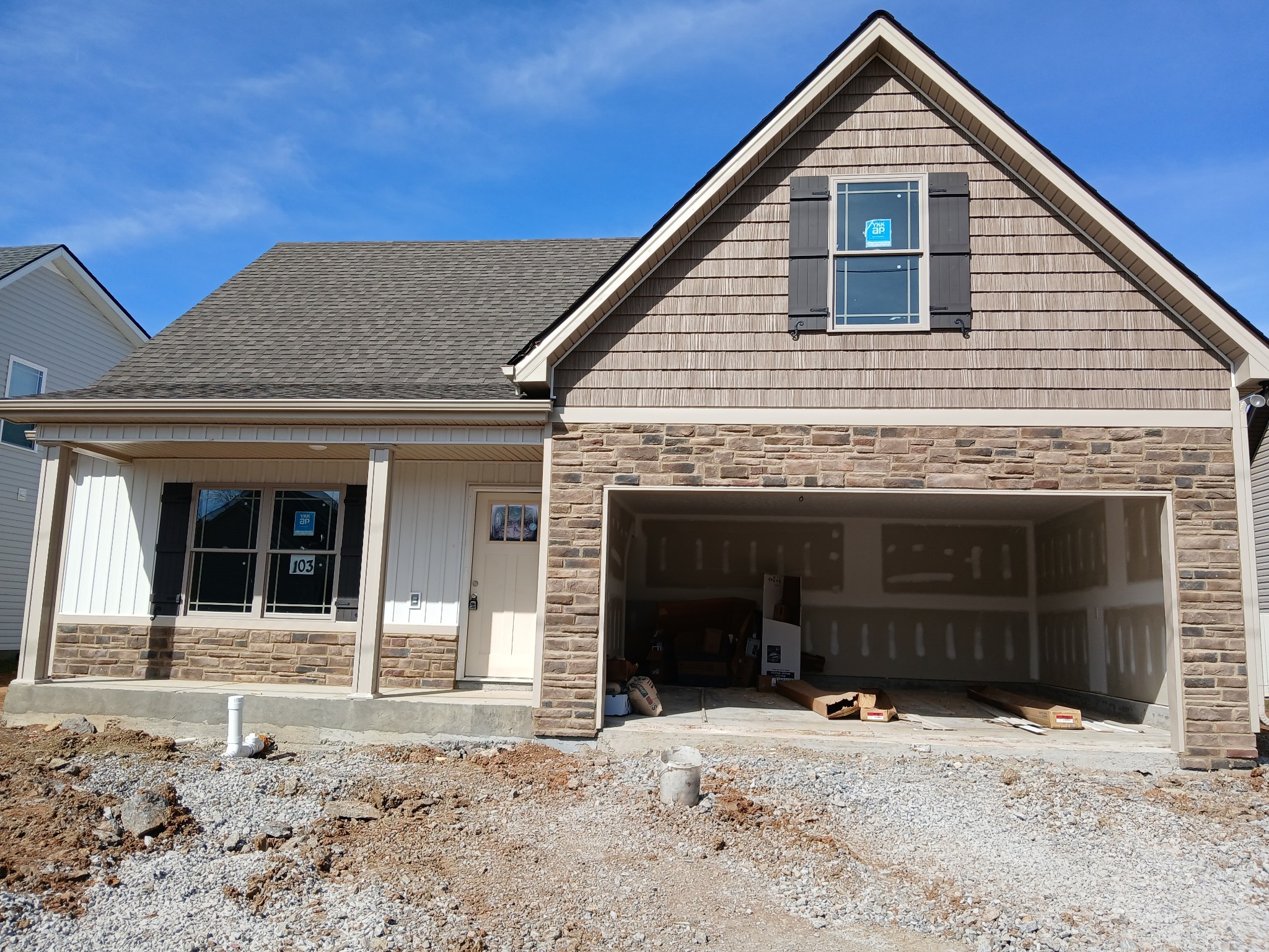2819 Upstream Road Christiana, TN 37037 - Photo 45 of 95 a front view of a house with a yard and garage