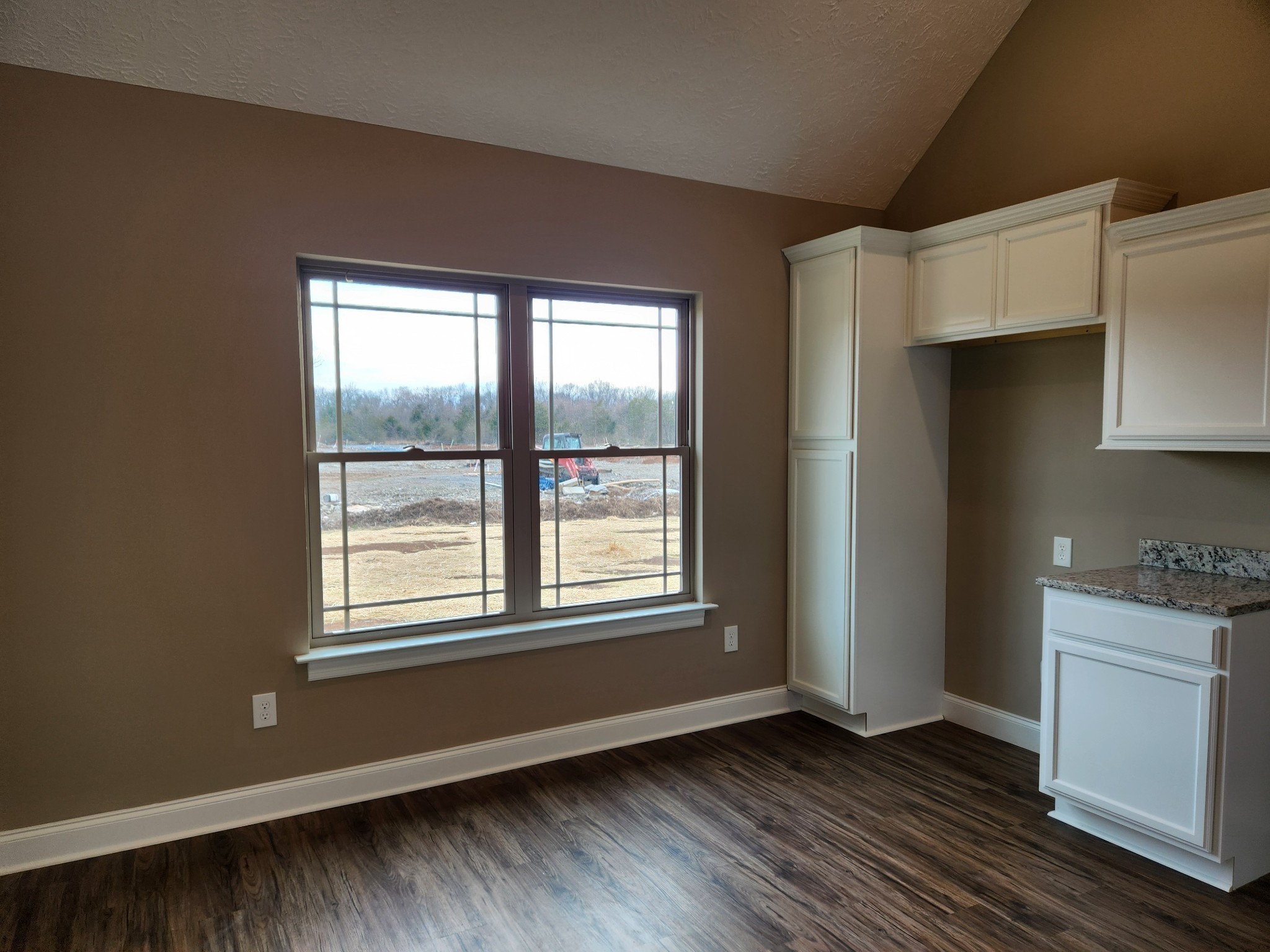 2819 Upstream Road Christiana, TN 37037 - Photo 71 of 95 a view of an empty room with wooden floor and a window