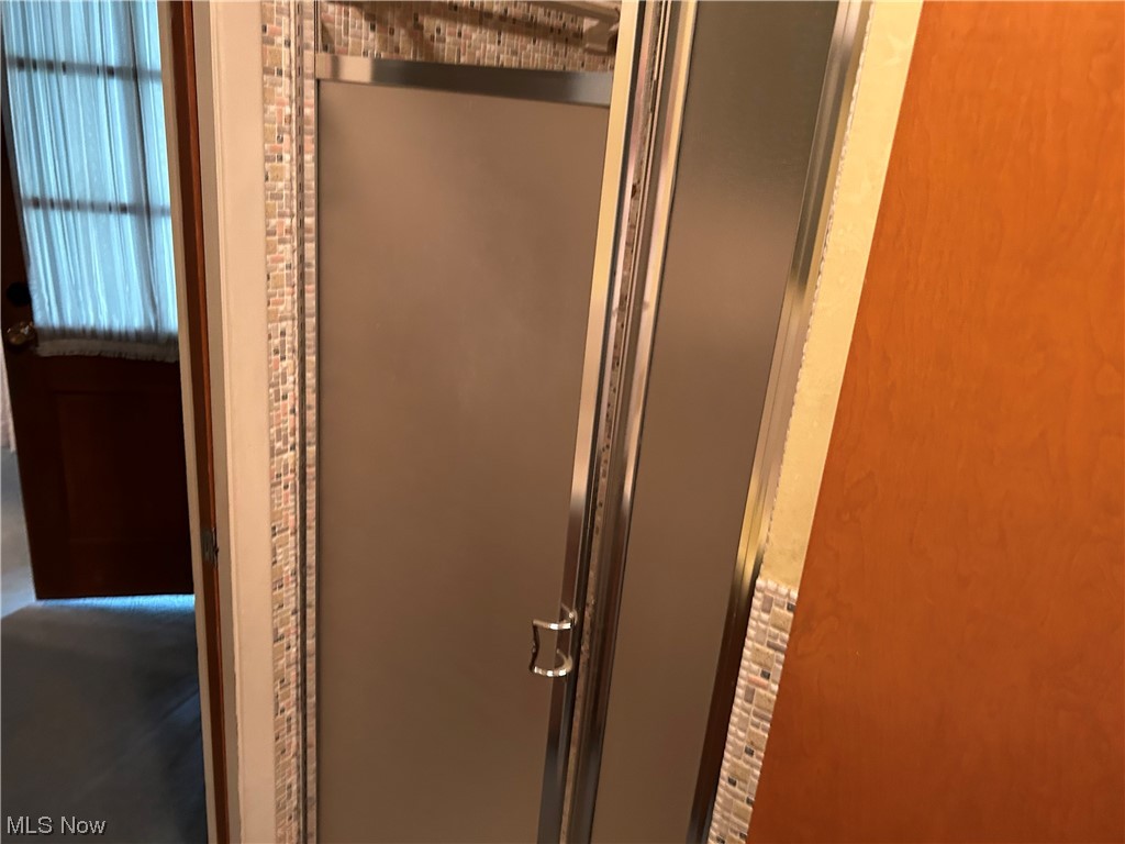 419 High Meadow Road Amherst, OH 44001 - Photo 25 of 27 Pass Thru Bathroom