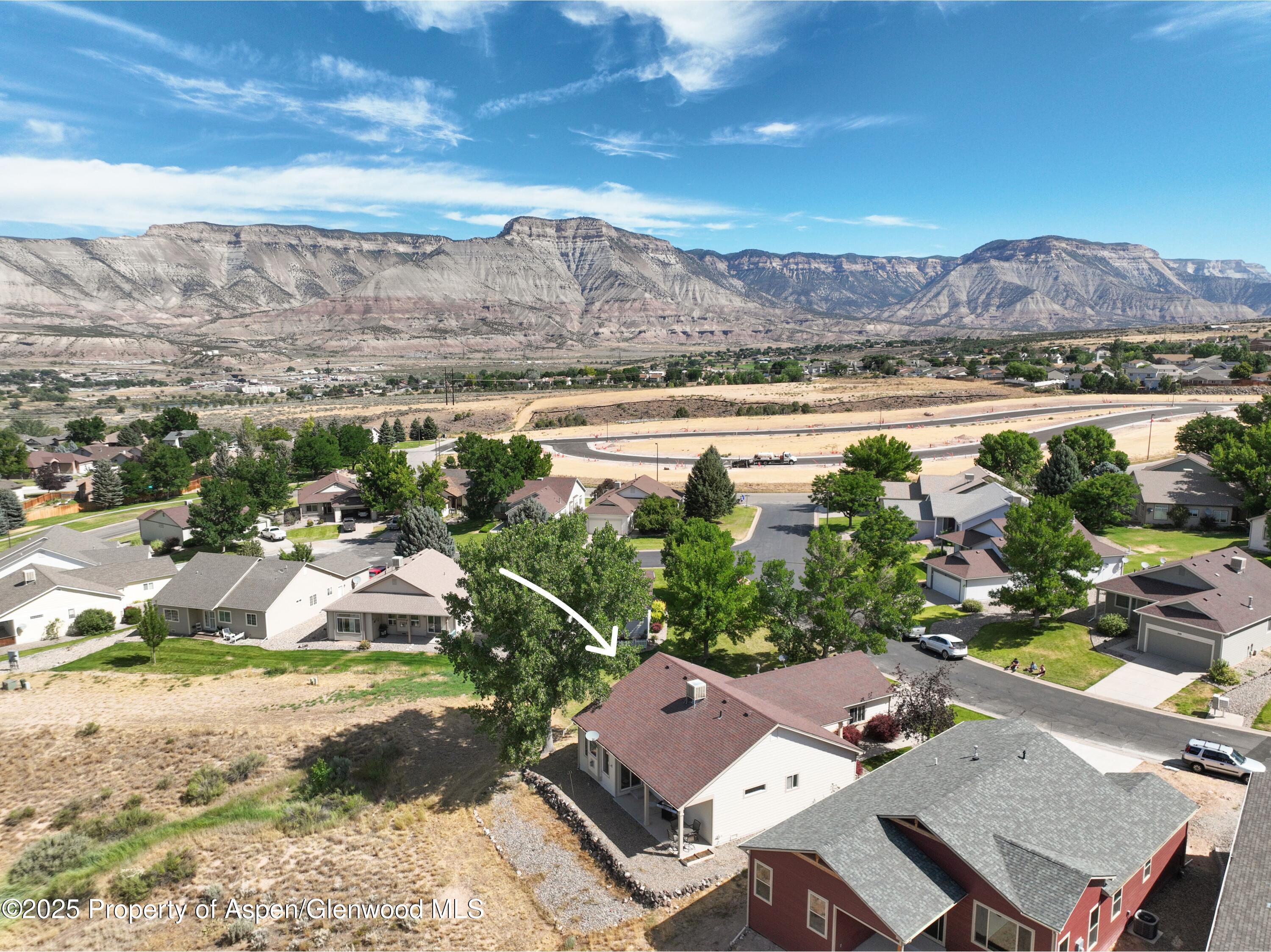 250 Limberpine Circle Battlement Mesa, CO 81635 - Photo 28 of 34 an aerial view of a house with a lake view
