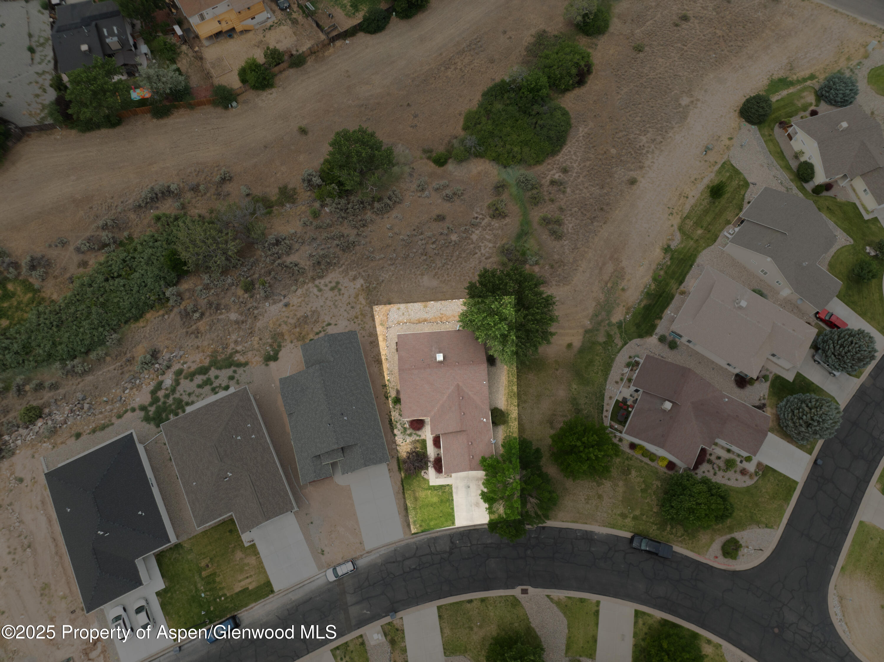 250 Limberpine Circle Battlement Mesa, CO 81635 - Photo 34 of 34 an aerial view of a house with a yard