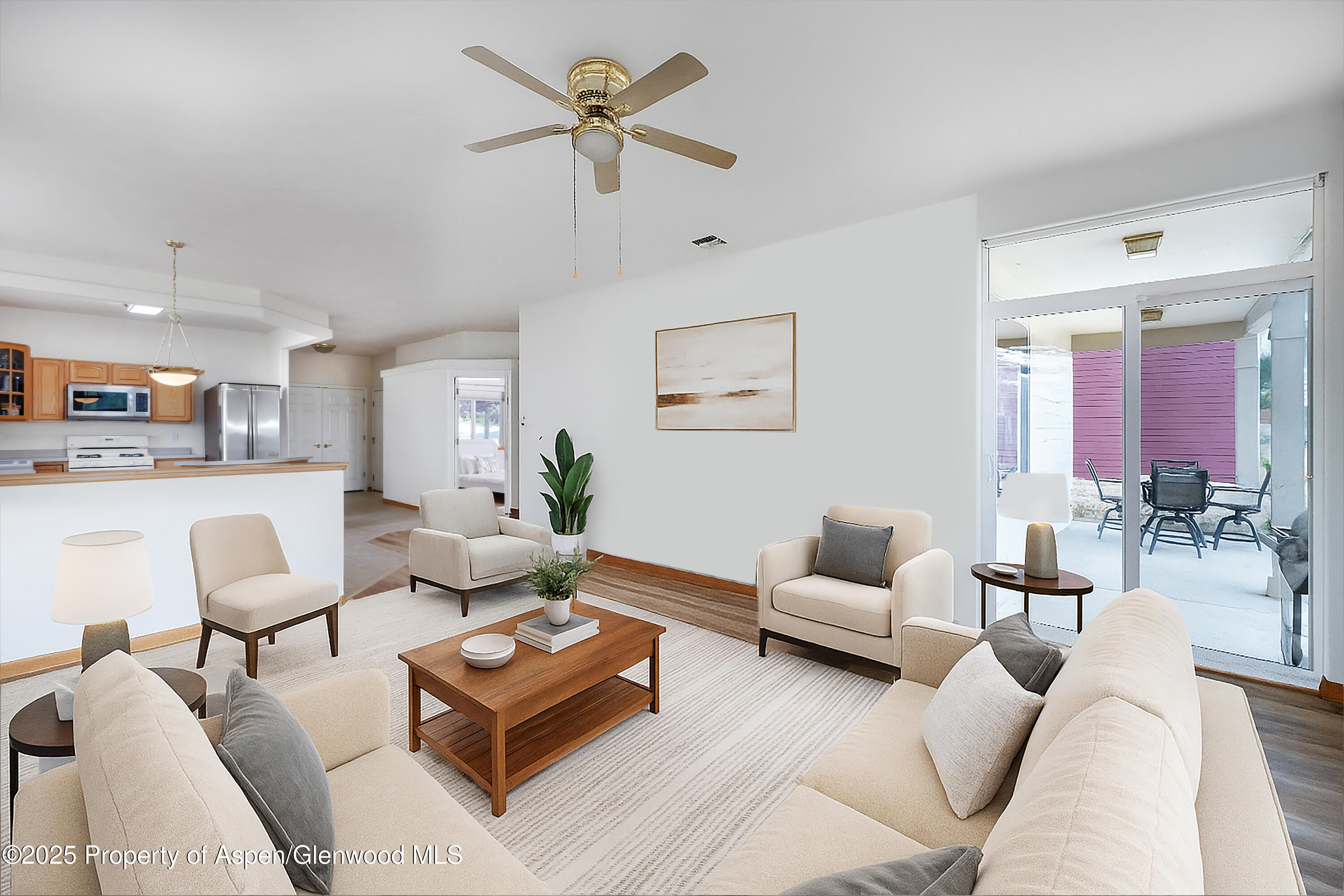 250 Limberpine Circle Battlement Mesa, CO 81635 - Photo 8 of 34 a living room with furniture and a chandelier