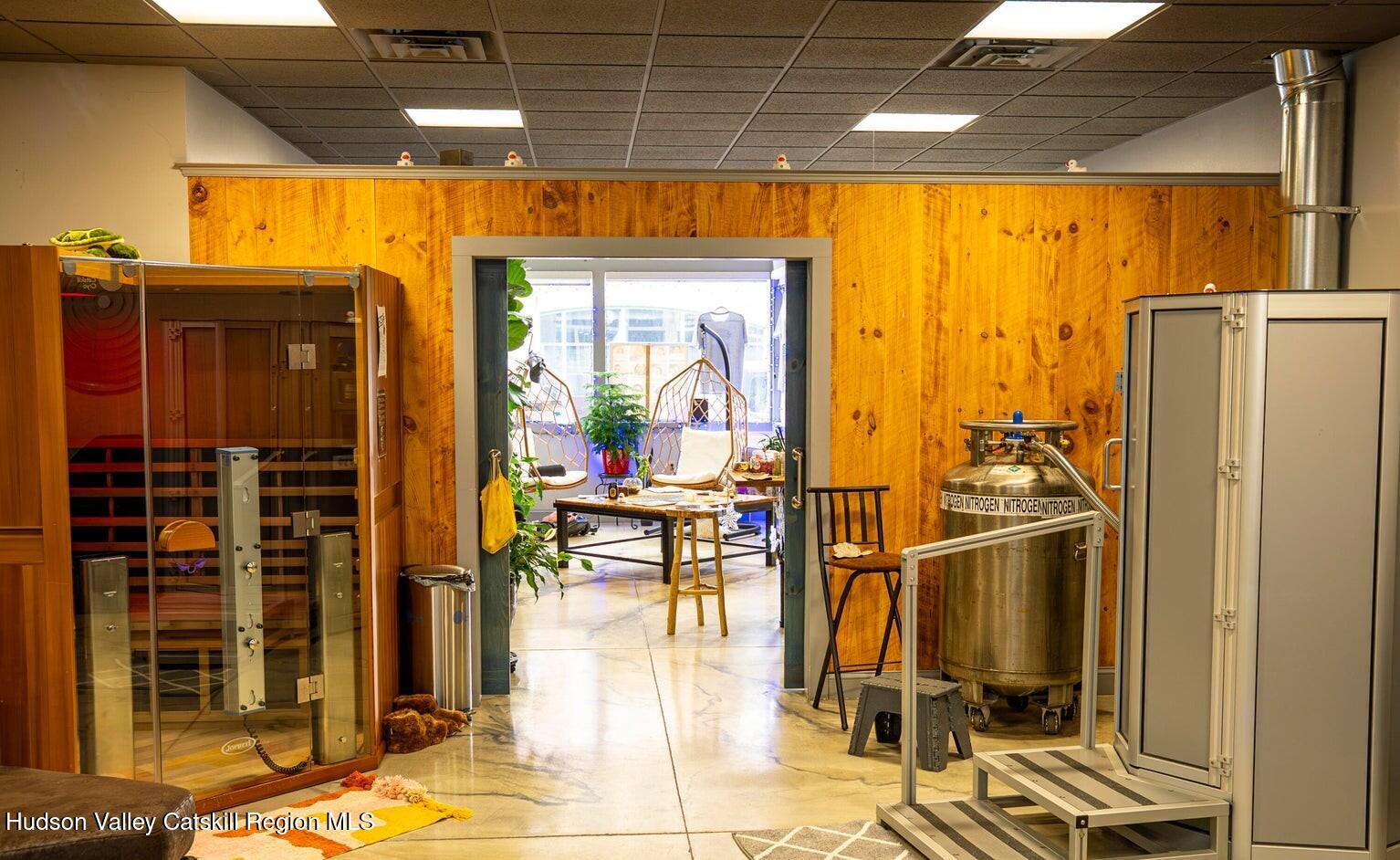 414 Main Street Catskill, NY 12414 - Photo 7 of 11 a view of a living room with a table and chairs