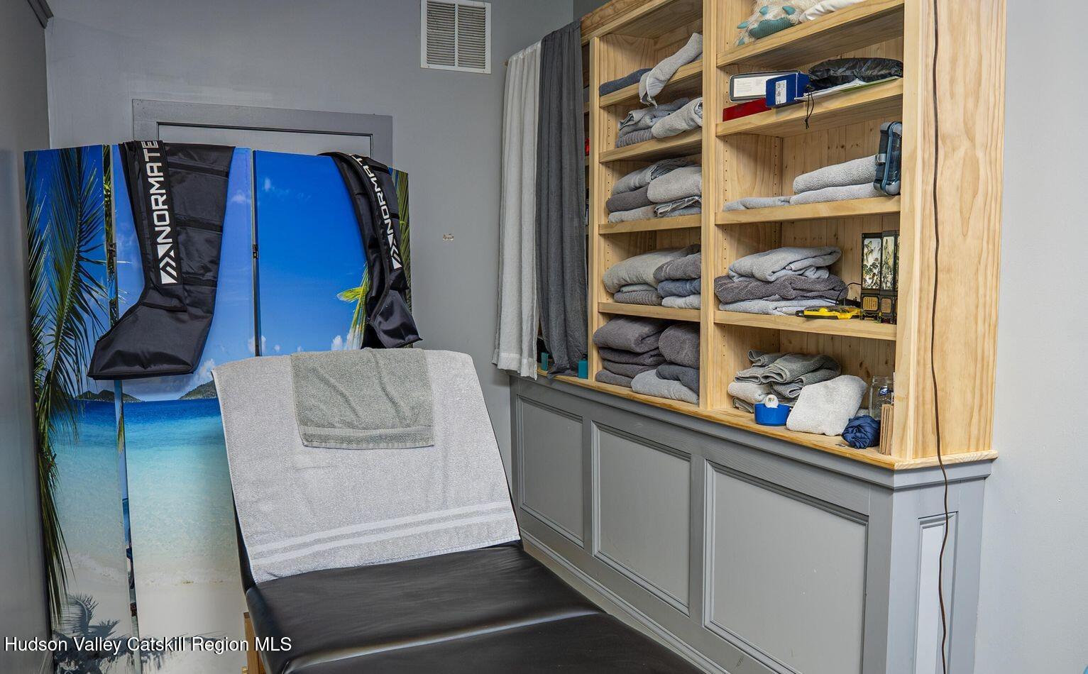 414 Main Street Catskill, NY 12414 - Photo 9 of 11 a view of walk in closet with clothes and shoes