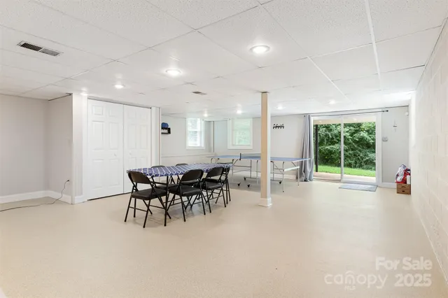 a view of balcony with deck and trees