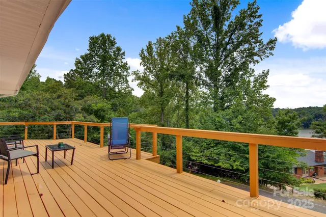 a view of a chairs on the deck