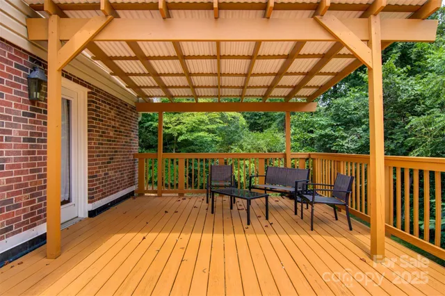 a view of deck with furniture and wooden floor