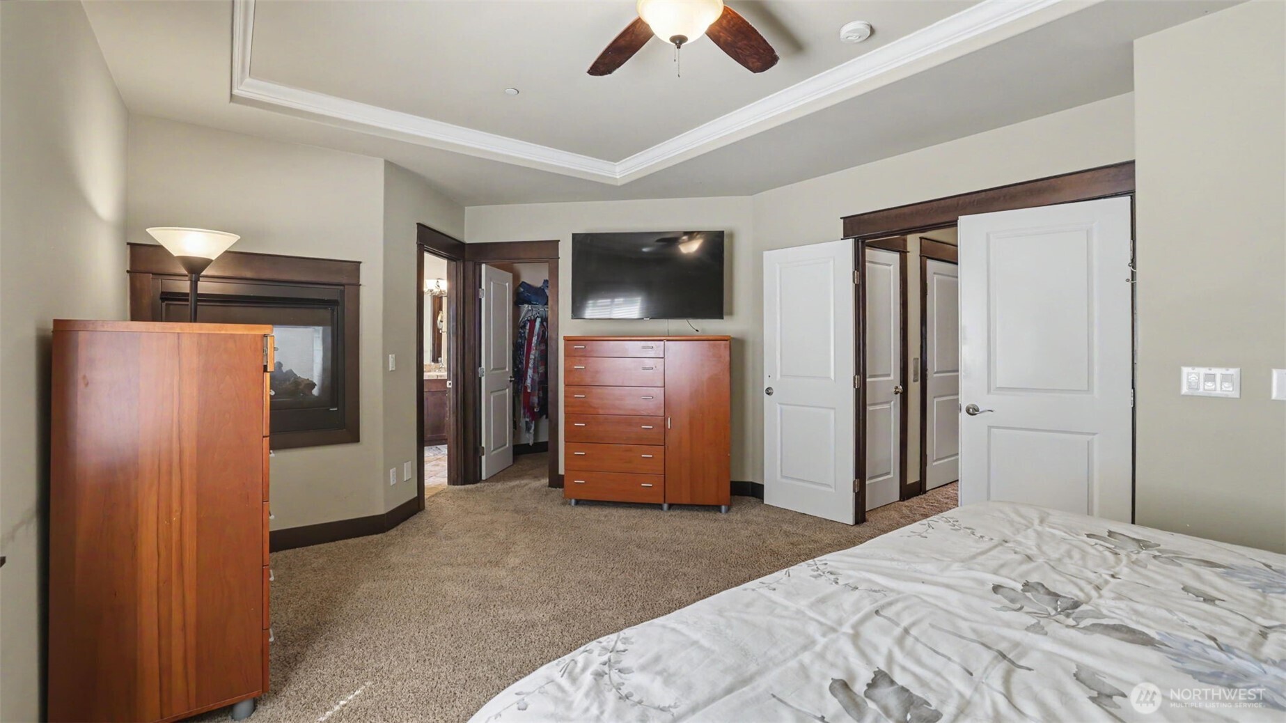 1357 Elma Place Northeast Renton, WA 98059 - Photo 17 of 40 a bedroom with a bed and a television
