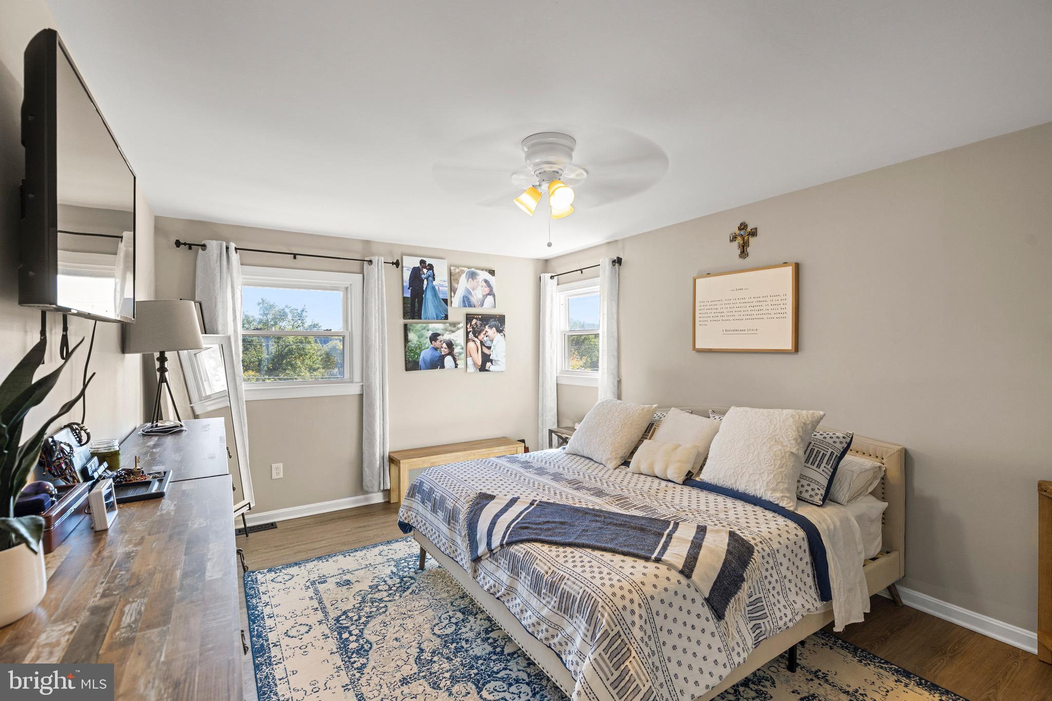 6666 Kelly Road Warrenton, VA 20187 - Photo 13 of 34 a bedroom with bed and a flat tv screen on the dresser