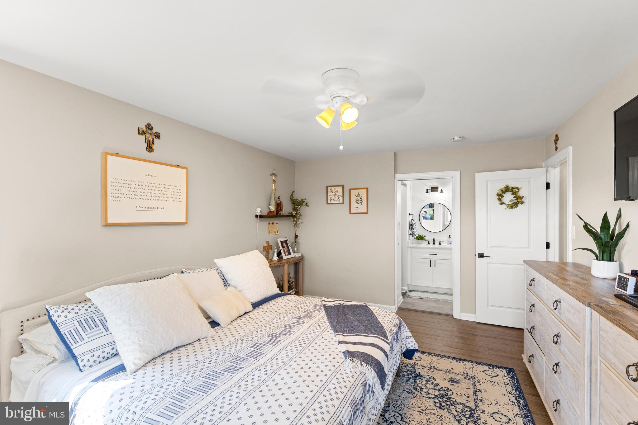 6666 Kelly Road Warrenton, VA 20187 - Photo 14 of 34 a bedroom with a bed and a dresser