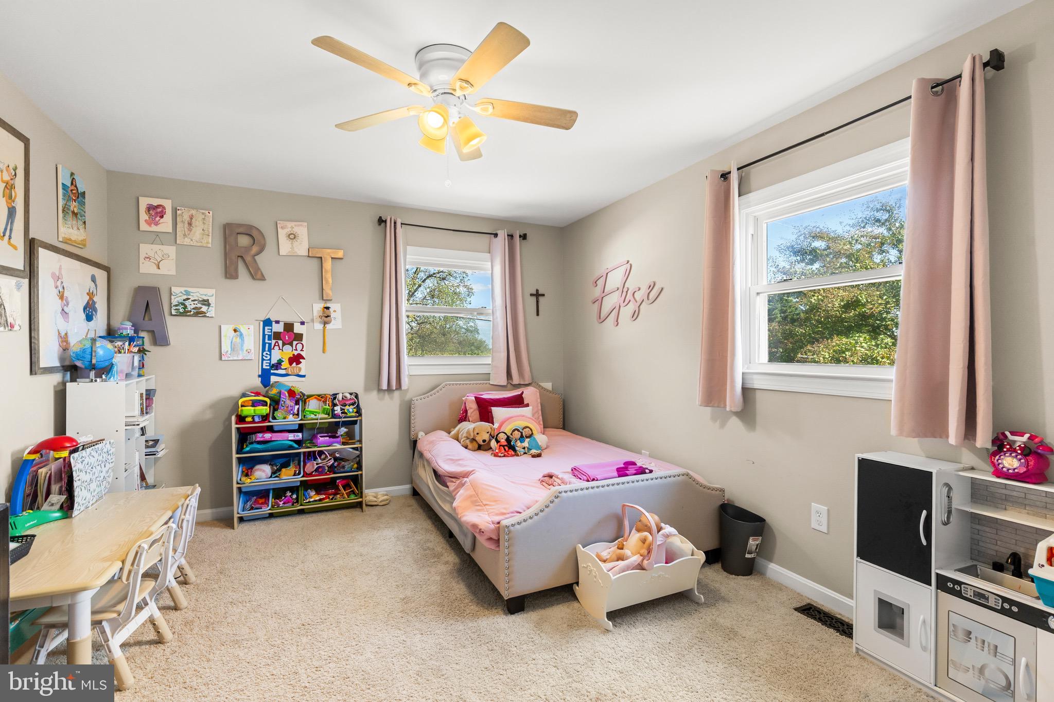 6666 Kelly Road Warrenton, VA 20187 - Photo 19 of 34 a bedroom with a bed closet and a window