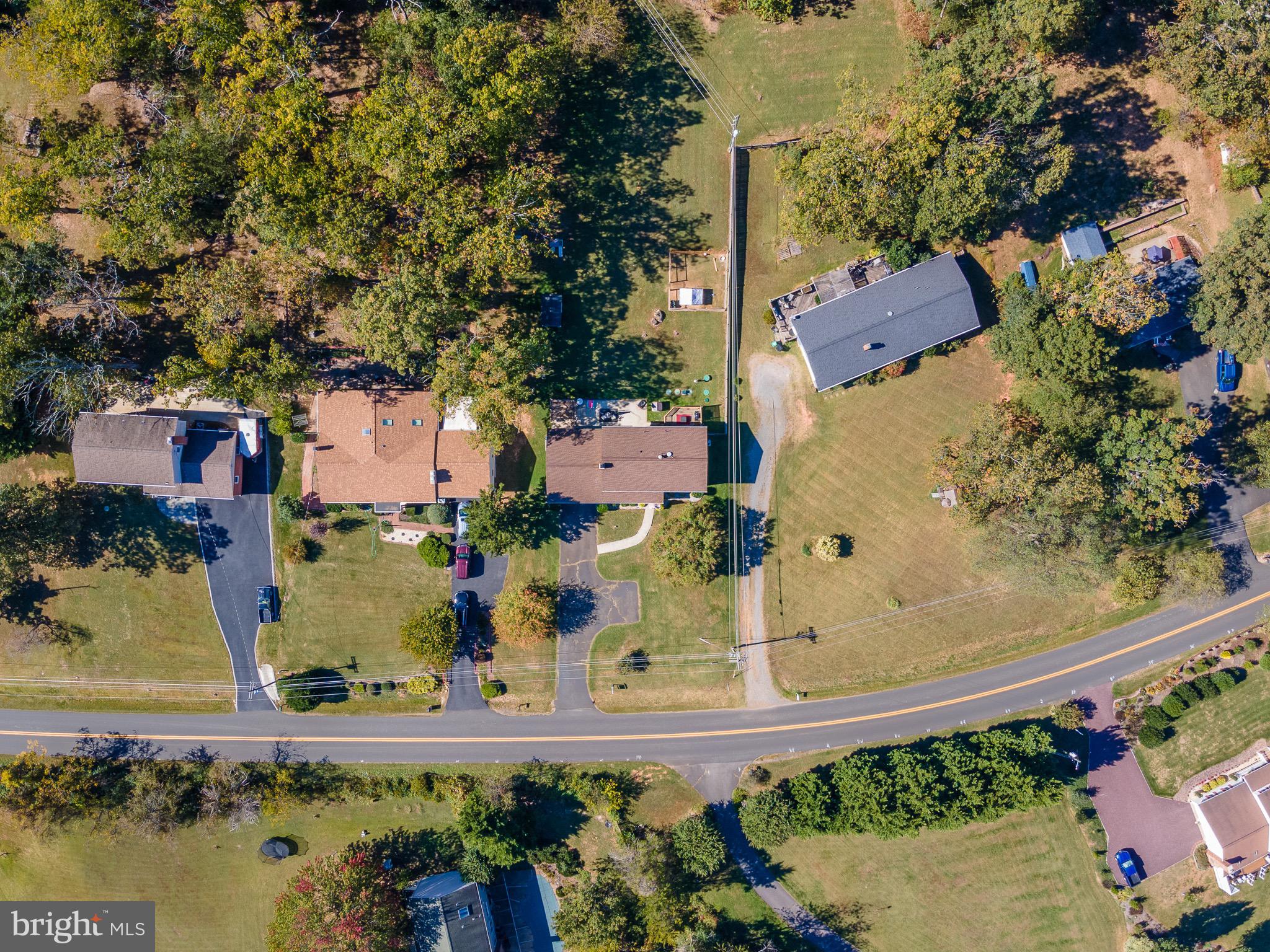6666 Kelly Road Warrenton, VA 20187 - Photo 29 of 34 an aerial view of a house with a yard