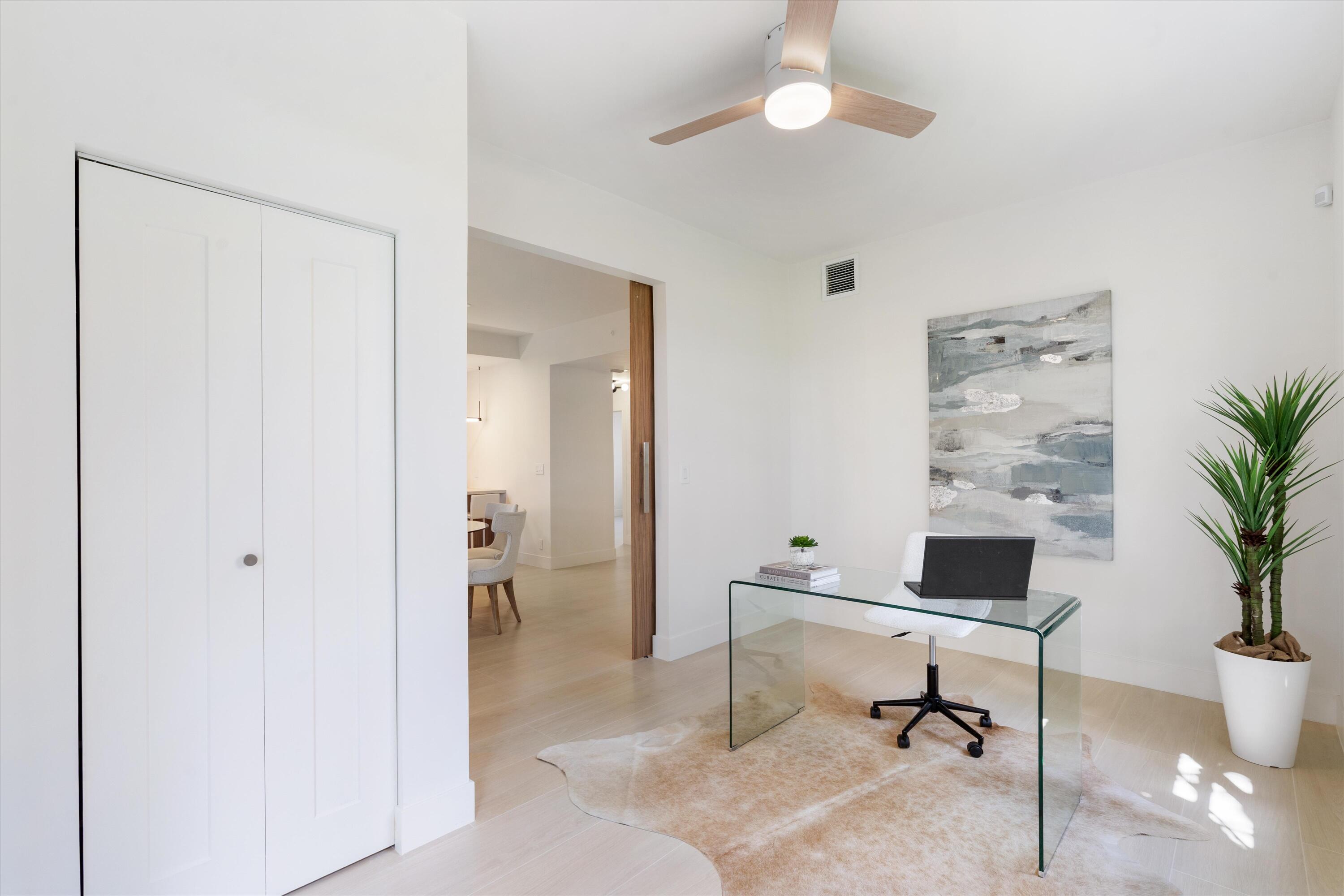 5154 Lake Catalina Drive, Unit A Boca Raton, FL 33496 - Photo 21 of 51 a workspace with furniture and a potted plant