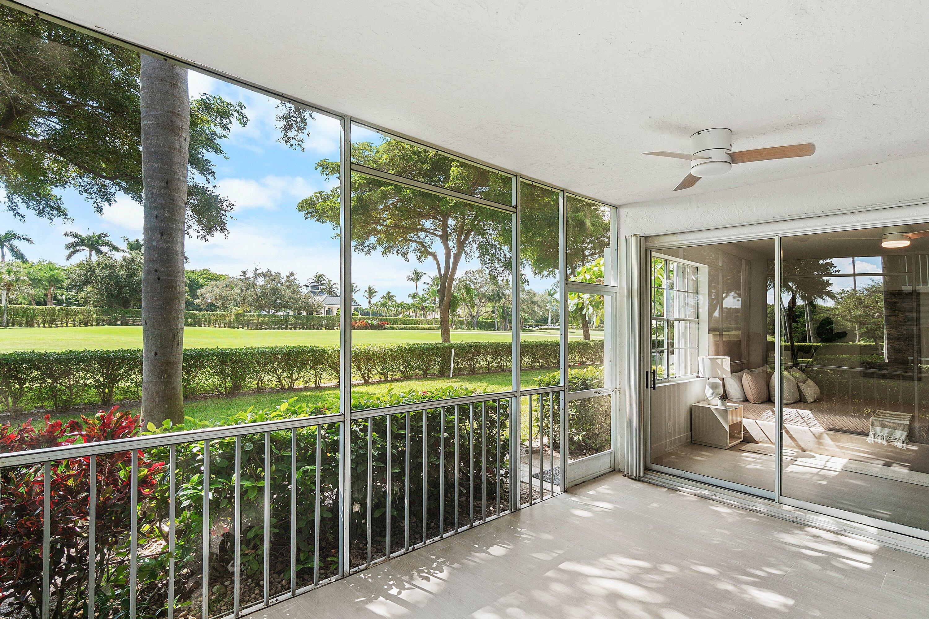 5154 Lake Catalina Drive, Unit A Boca Raton, FL 33496 - Photo 24 of 51 a view of a porch with chairs and backyard