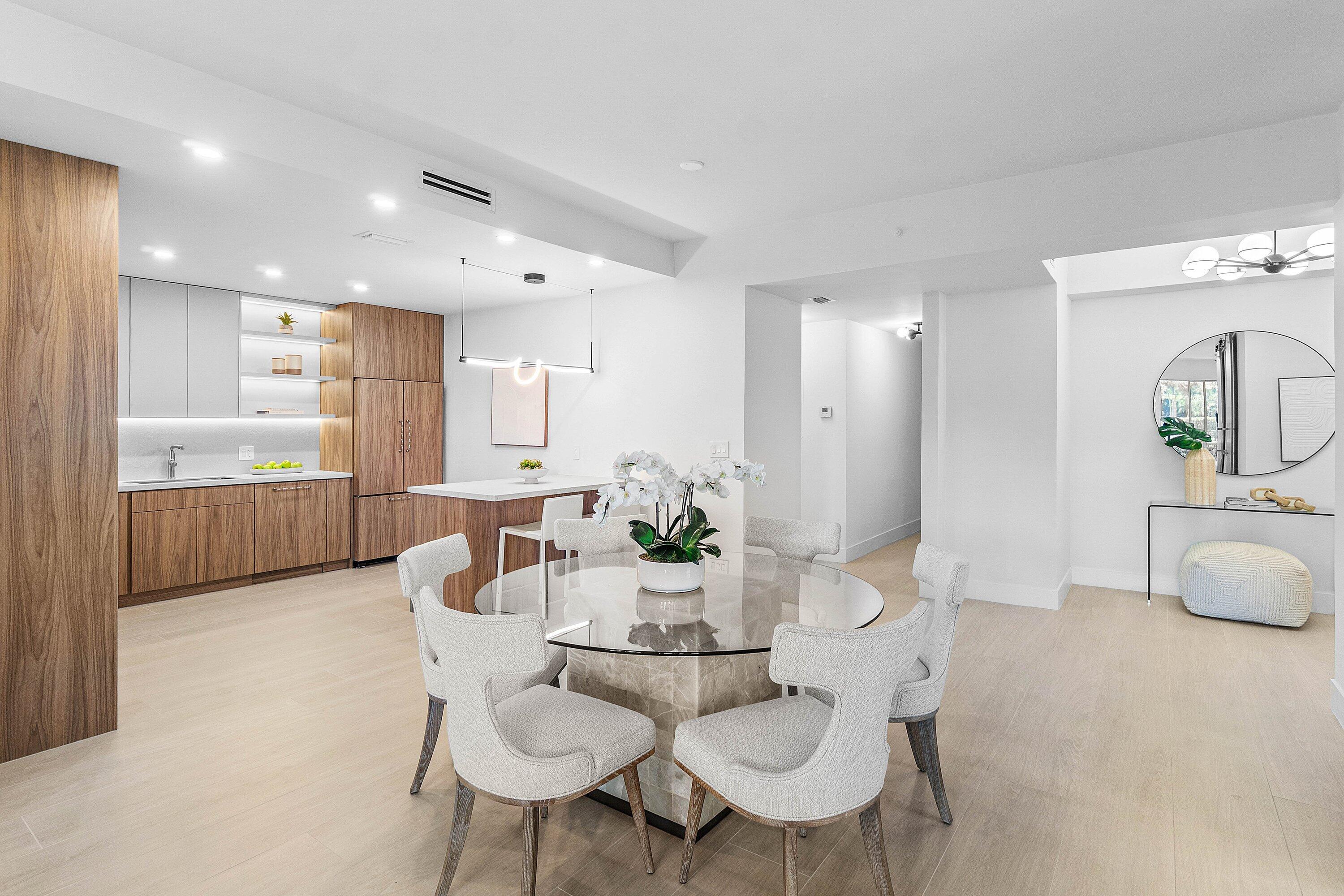 5154 Lake Catalina Drive, Unit A Boca Raton, FL 33496 - Photo 5 of 51 a view of a dining room with furniture and wooden floor