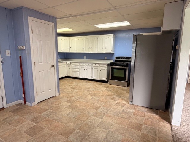 7422 Greenstone Street Houston, TX 77087 - Photo 3 of 15 a kitchen with a stove and a refrigerator