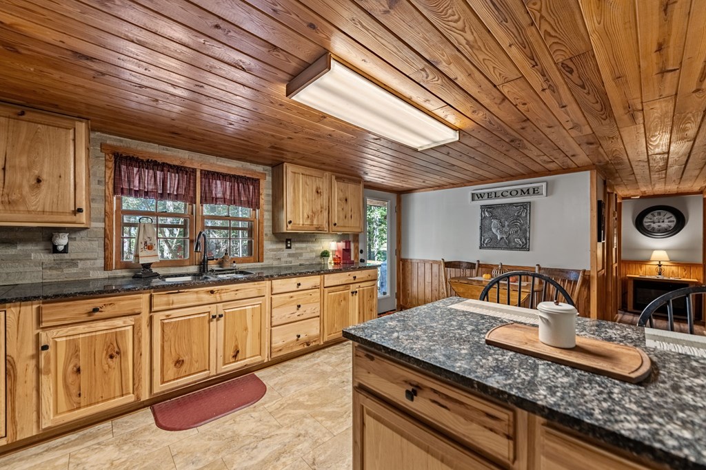 134 Ebenezer Road Ellijay, GA 30536 - Photo 26 of 85 Large kitchen area with new cabinets, backsplash,