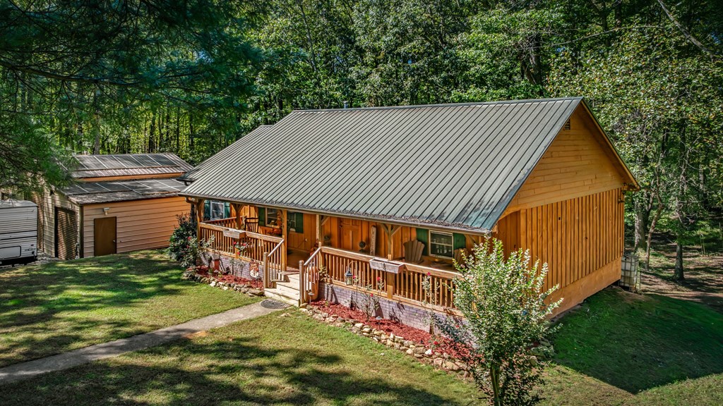 134 Ebenezer Road Ellijay, GA 30536 - Photo 47 of 85 a backyard of a house with lots of green space