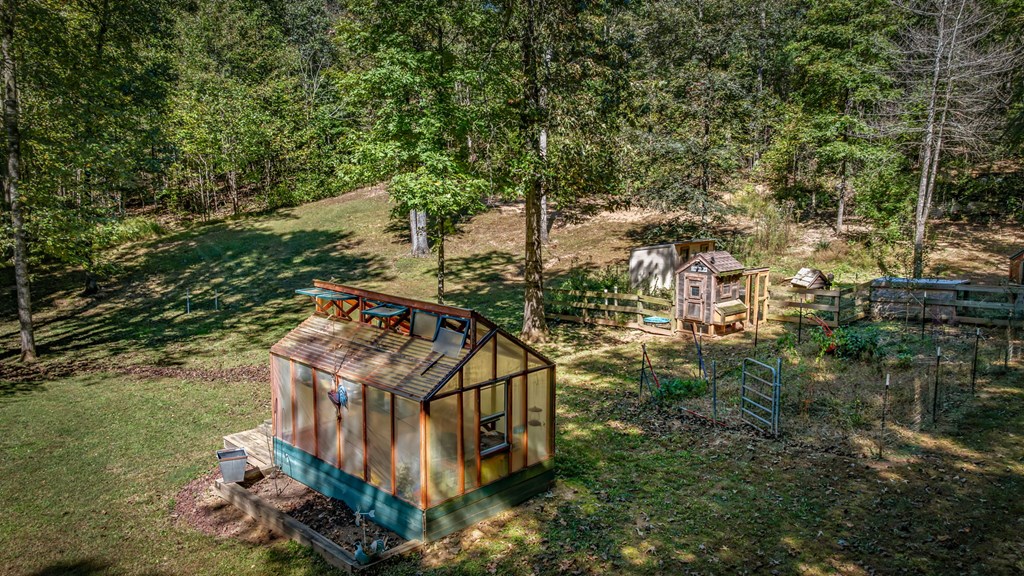 134 Ebenezer Road Ellijay, GA 30536 - Photo 75 of 85 a view of a house with a small yard