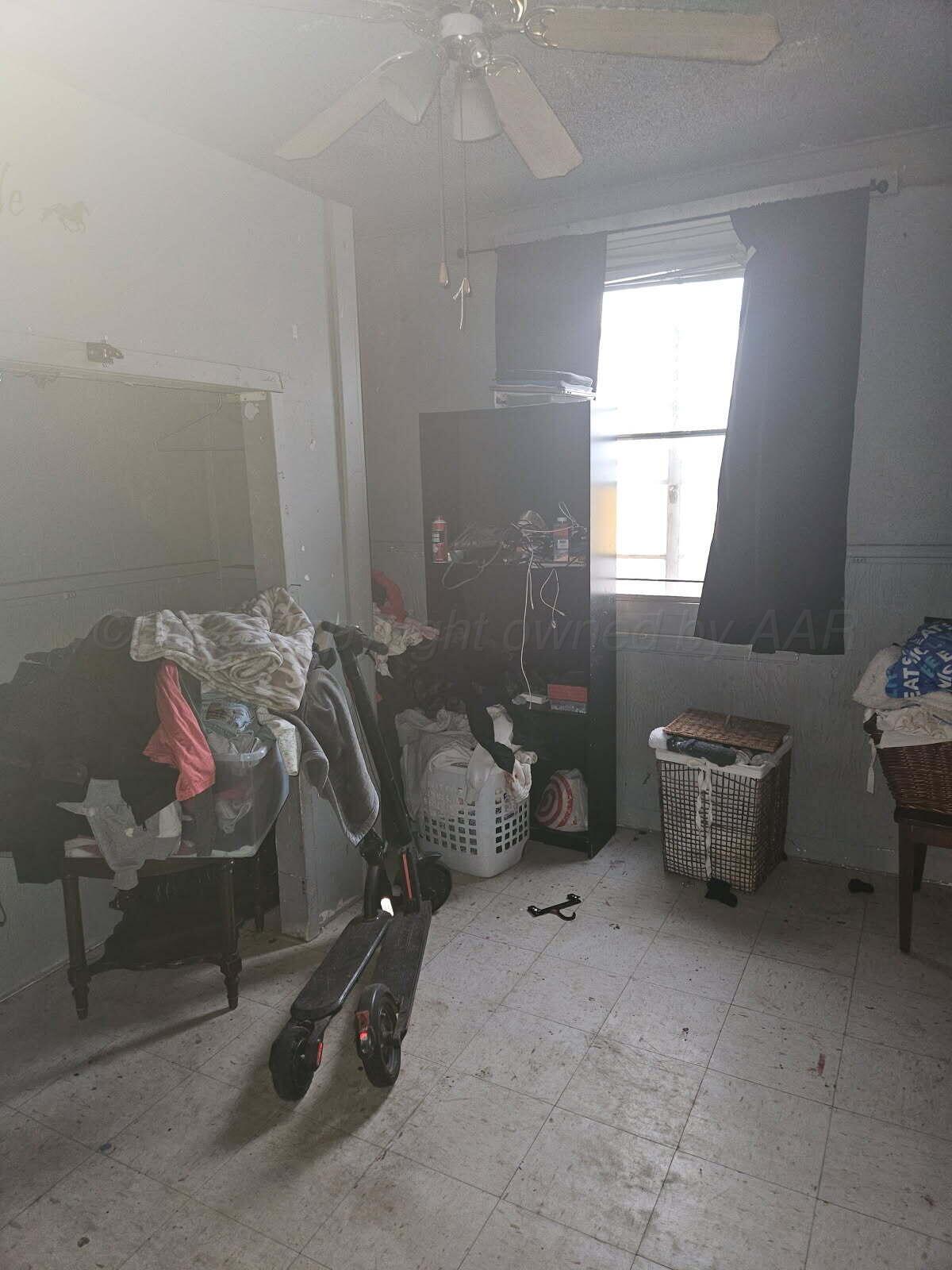 418 South Main Street Borger, TX 79007 - Photo 24 of 41 a room with storage and window