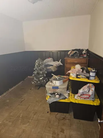 a kitchen with stainless steel appliances granite countertop a stove and a refrigerator