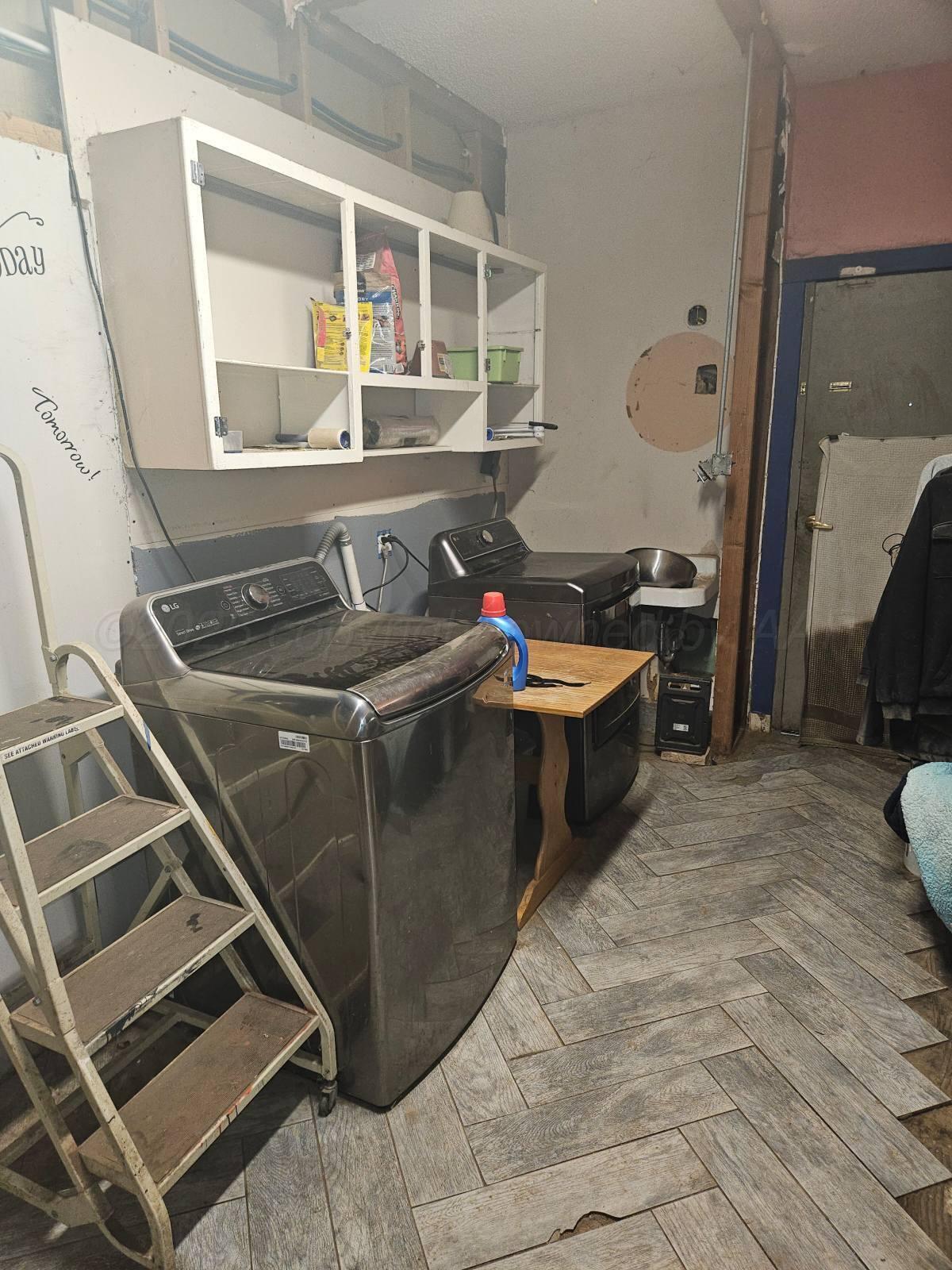 418 South Main Street Borger, TX 79007 - Photo 35 of 41 a room with storage and utility