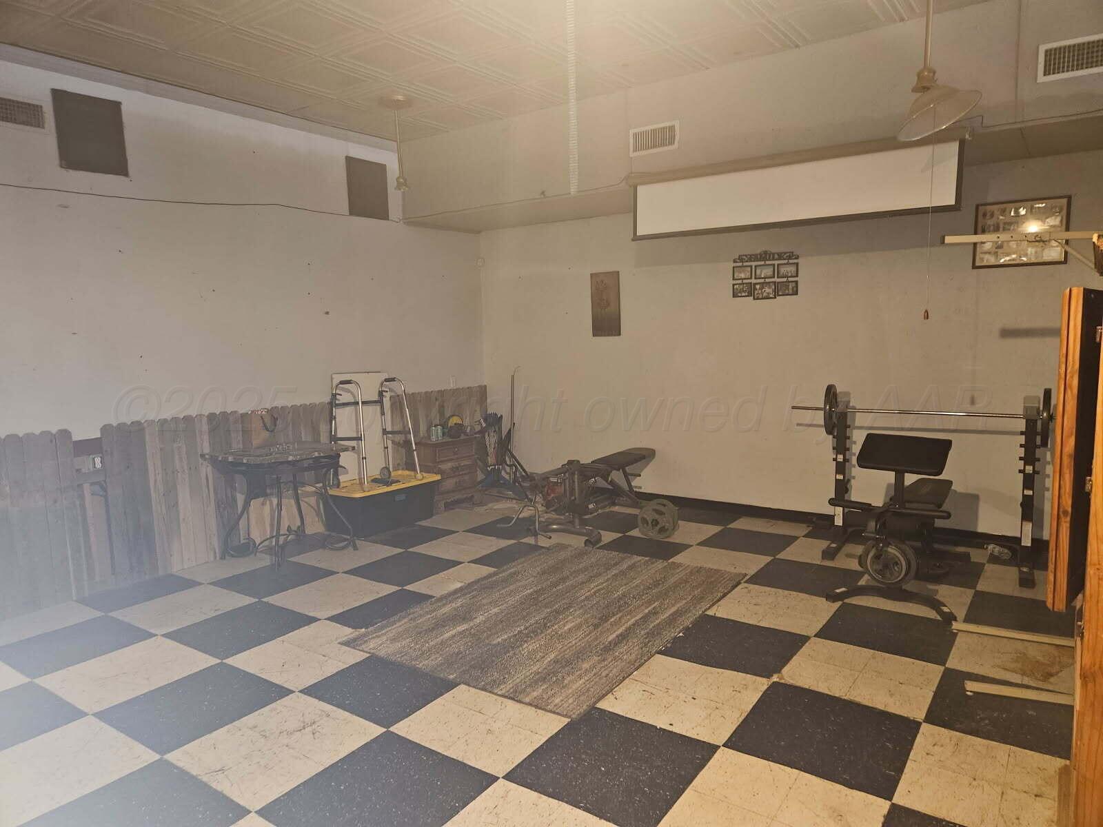 418 South Main Street Borger, TX 79007 - Photo 6 of 41 a view of a workspace with furniture