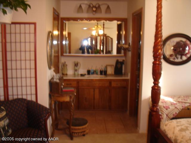 6306 Rutgers Street Amarillo, TX 79109 - Photo 11 of 16 Master bedroom view to bath