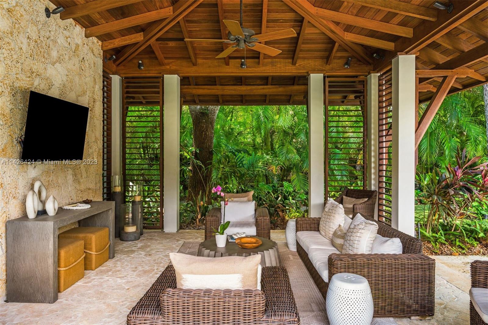 8601 Ponce De Leon Road Miami, FL 33143 - Photo 17 of 39 a outdoor living space with furniture and a potted plant