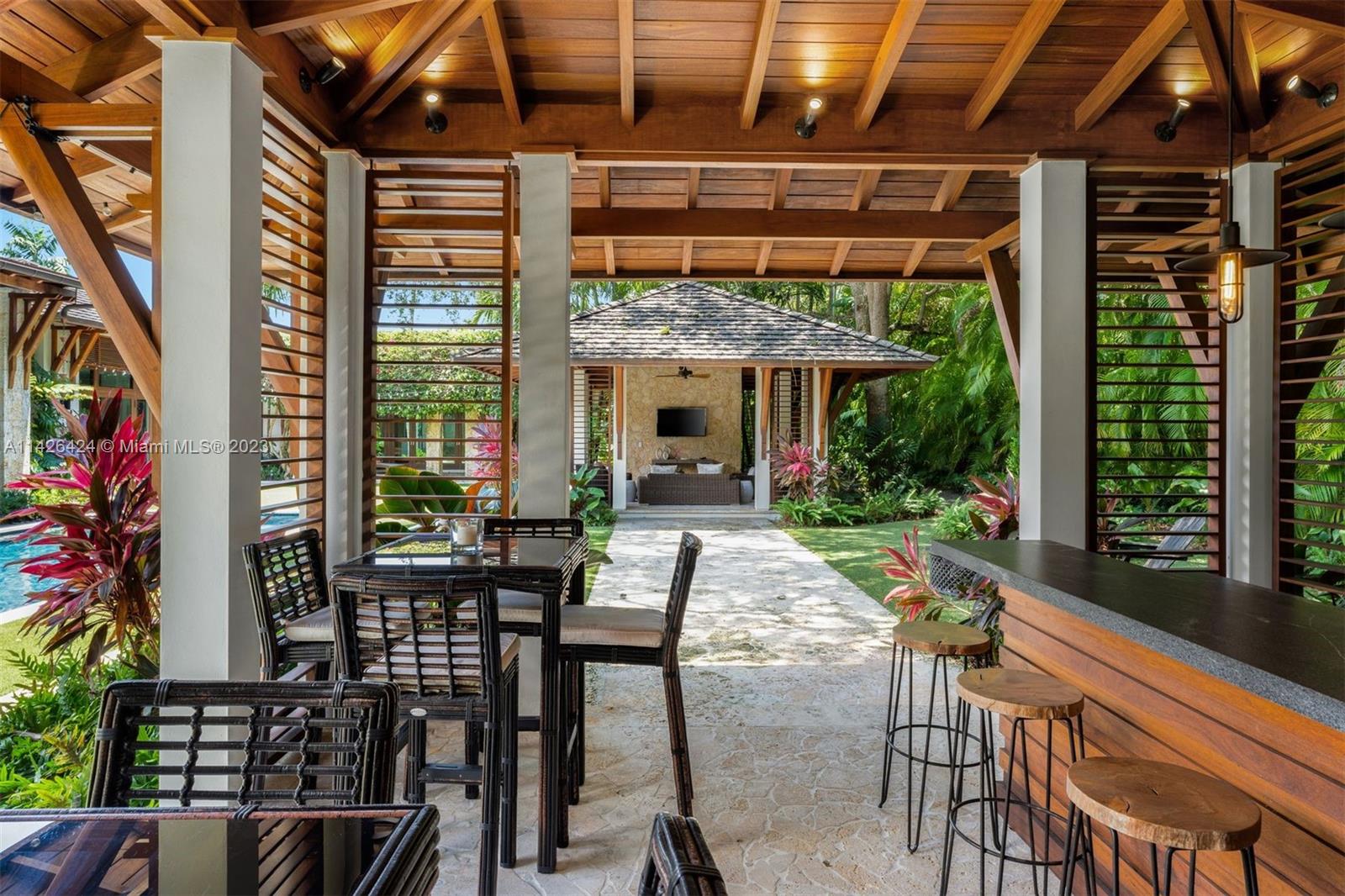 8601 Ponce De Leon Road Miami, FL 33143 - Photo 19 of 39 a patio with an outdoor space