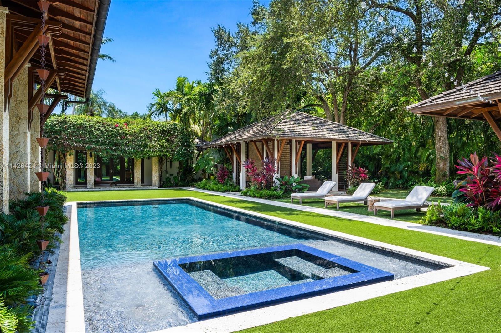 8601 Ponce De Leon Road Miami, FL 33143 - Photo 35 of 39 a view of swimming pool with sitting area and furniture