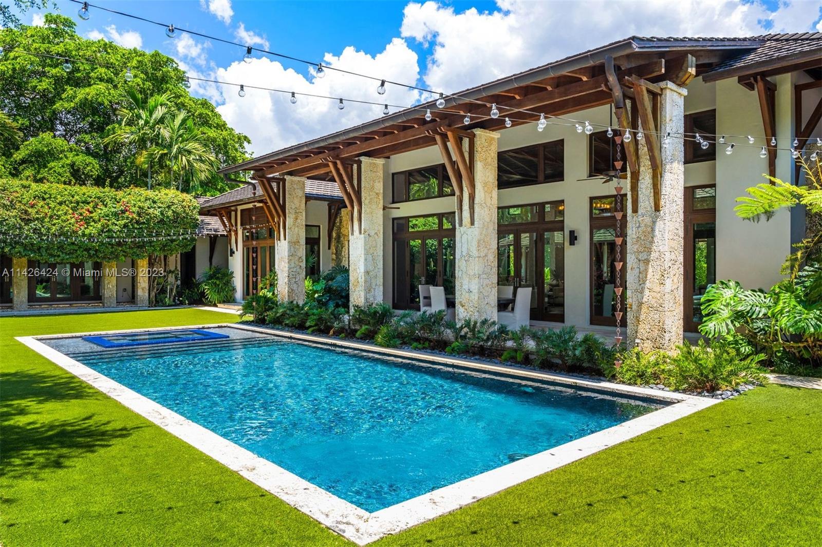 8601 Ponce De Leon Road Miami, FL 33143 - Photo 36 of 39 a view of a house with swimming pool