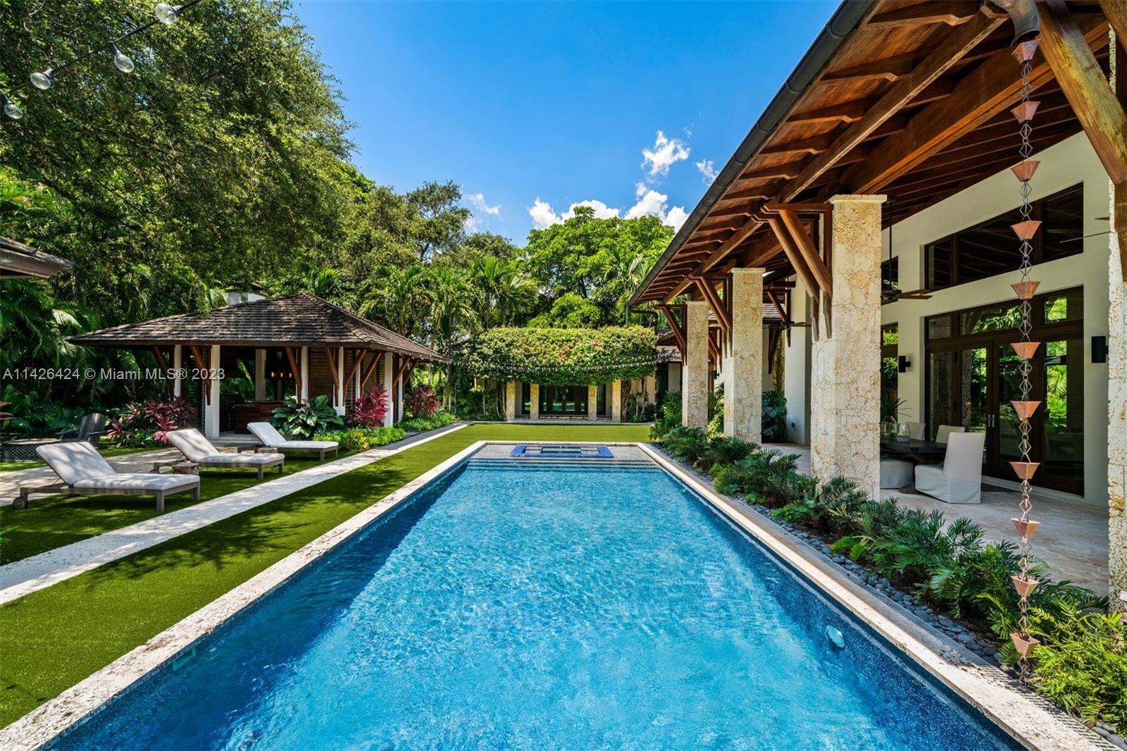 8601 Ponce De Leon Road Miami, FL 33143 - Photo 38 of 39 a view of an house with backyard space and balcony