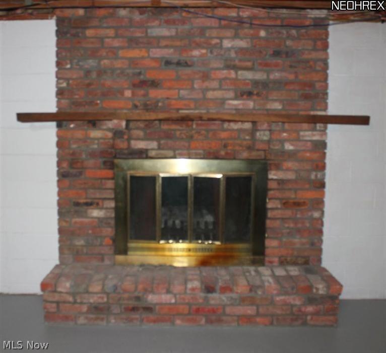 4231 Baird Road Stow, OH 44224 - Photo 21 of 23 Imagine the fabulous living space you could create around this beautiful fireplace.