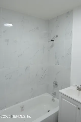 a bathroom with a bathtub