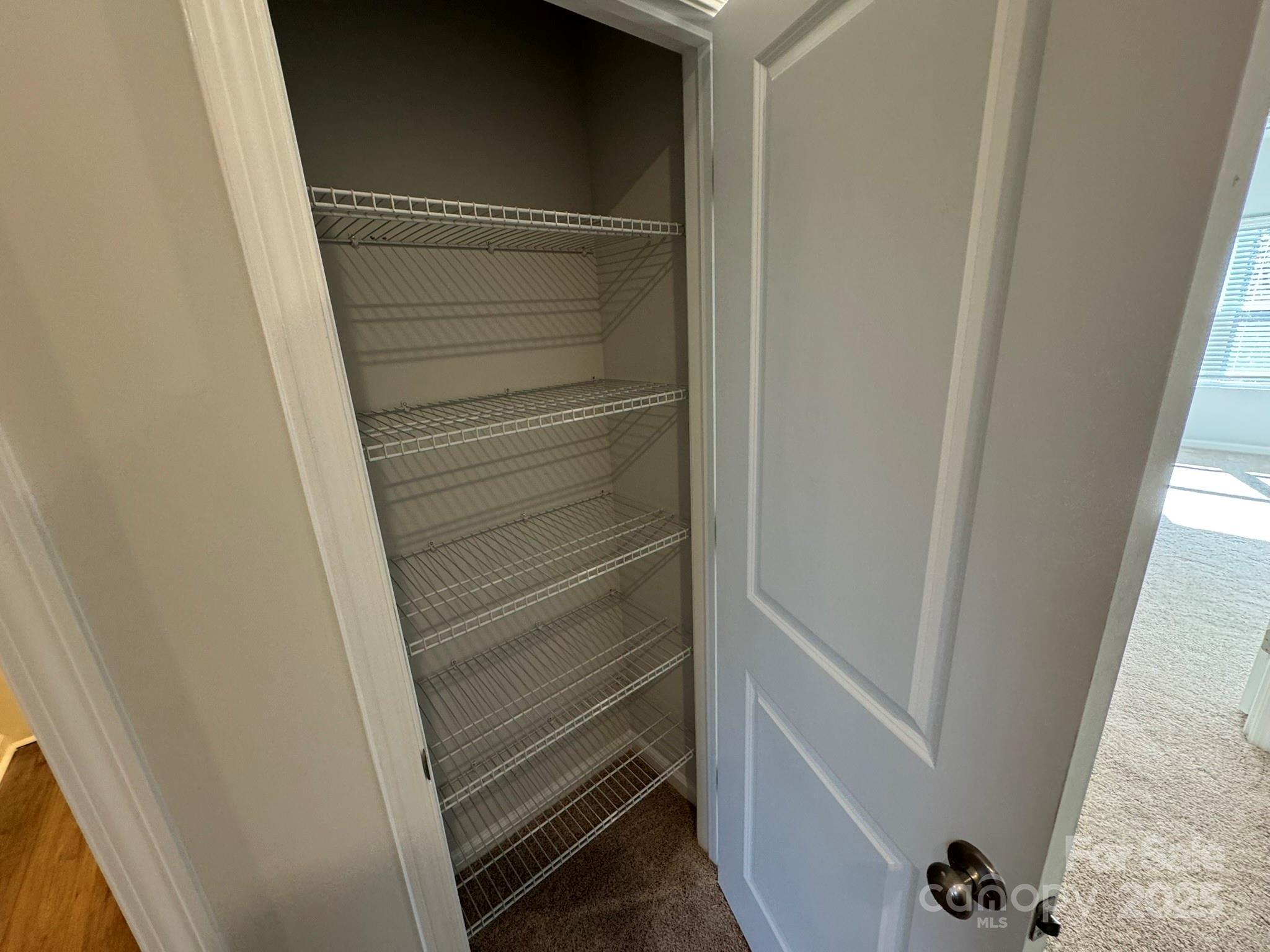 4750 Lakeview Road, Unit 18 Charlotte, NC 28216 - Photo 35 of 46 a view of walk in closet
