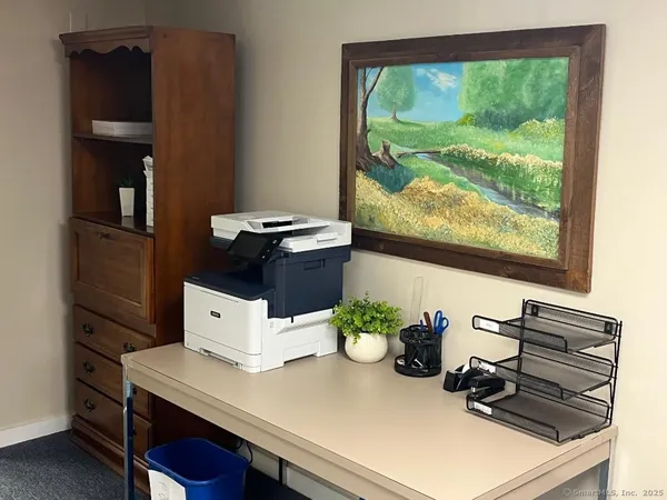 a room with furniture and a window