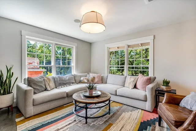 a bedroom with a bed and a couch