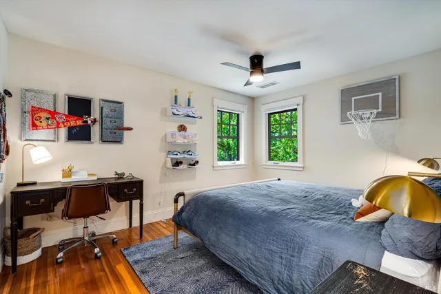 a view of a swimming pool with a yard