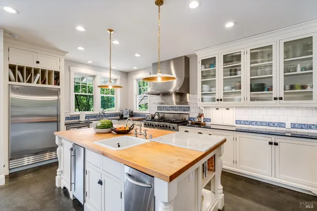 a dining room with furniture a livingroom and chandelier