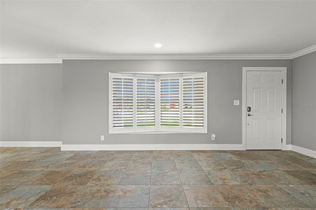 4003 Headsail Drive New Port Richey, FL 34652 - Photo 11 of 50 a view of an empty room with a window
