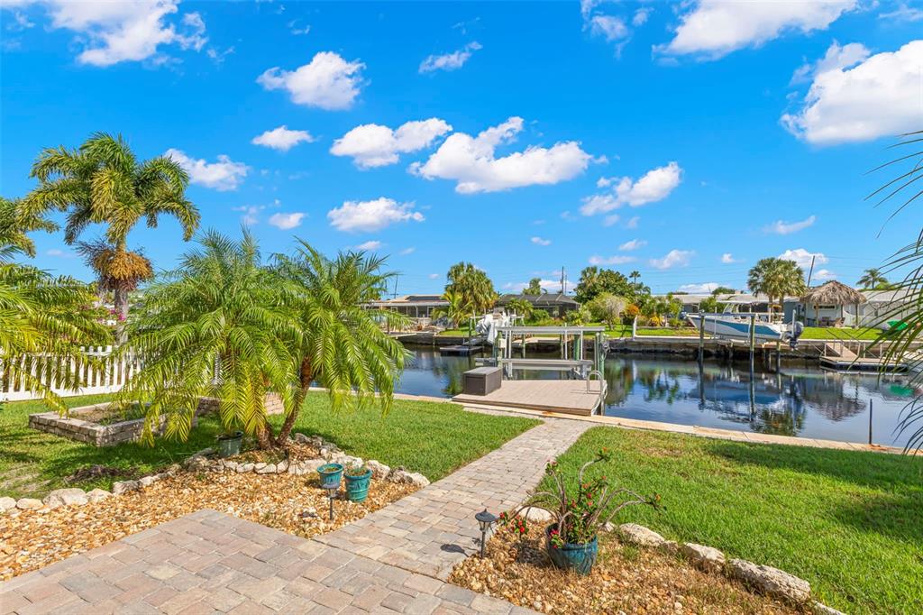 4003 Headsail Drive New Port Richey, FL 34652 - Photo 23 of 50 a view of a swimming pool with a patio