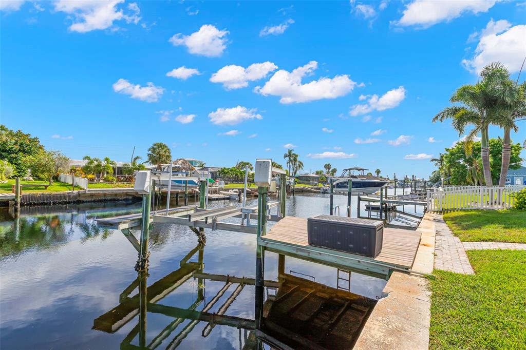 4003 Headsail Drive New Port Richey, FL 34652 - Photo 25 of 50 a view of a lake with couches and city view