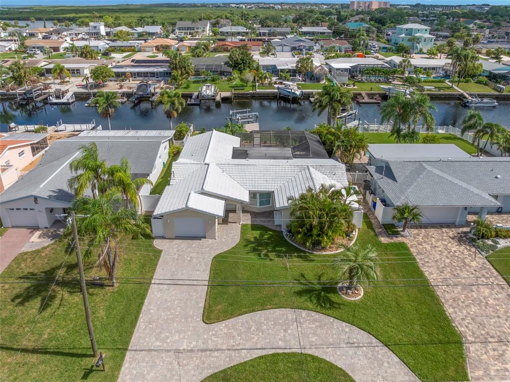 4003 Headsail Drive New Port Richey, FL 34652 - Photo 27 of 50 an aerial view of a house with a lake view