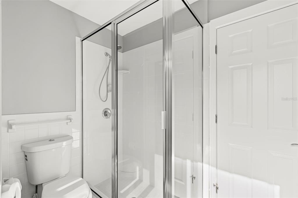 4003 Headsail Drive New Port Richey, FL 34652 - Photo 39 of 50 a bathroom with a shower and a toilet