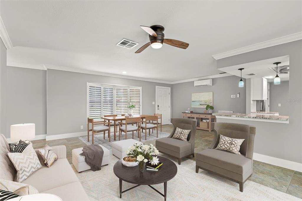 4003 Headsail Drive New Port Richey, FL 34652 - Photo 4 of 50 a living room with furniture and a large window